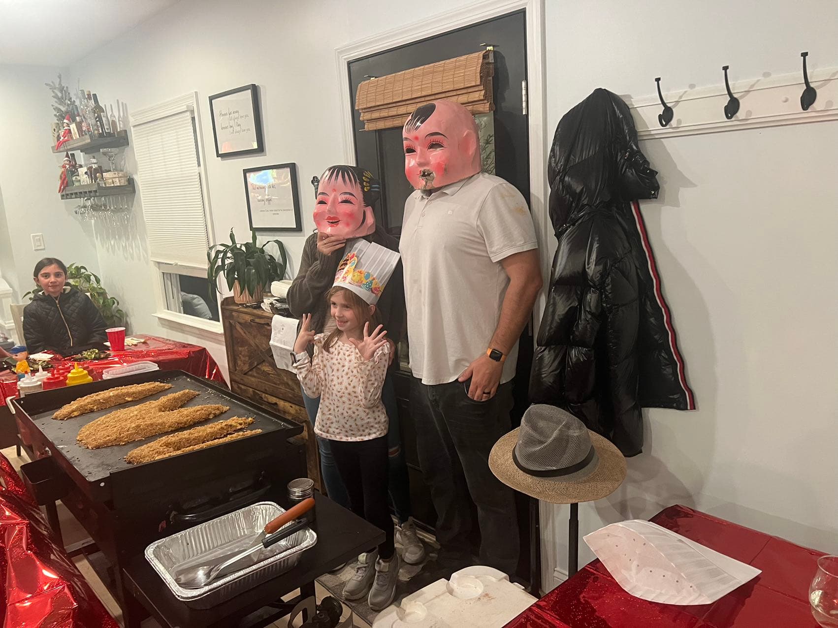 birthday hibachi party with fried rice cooking on the grill